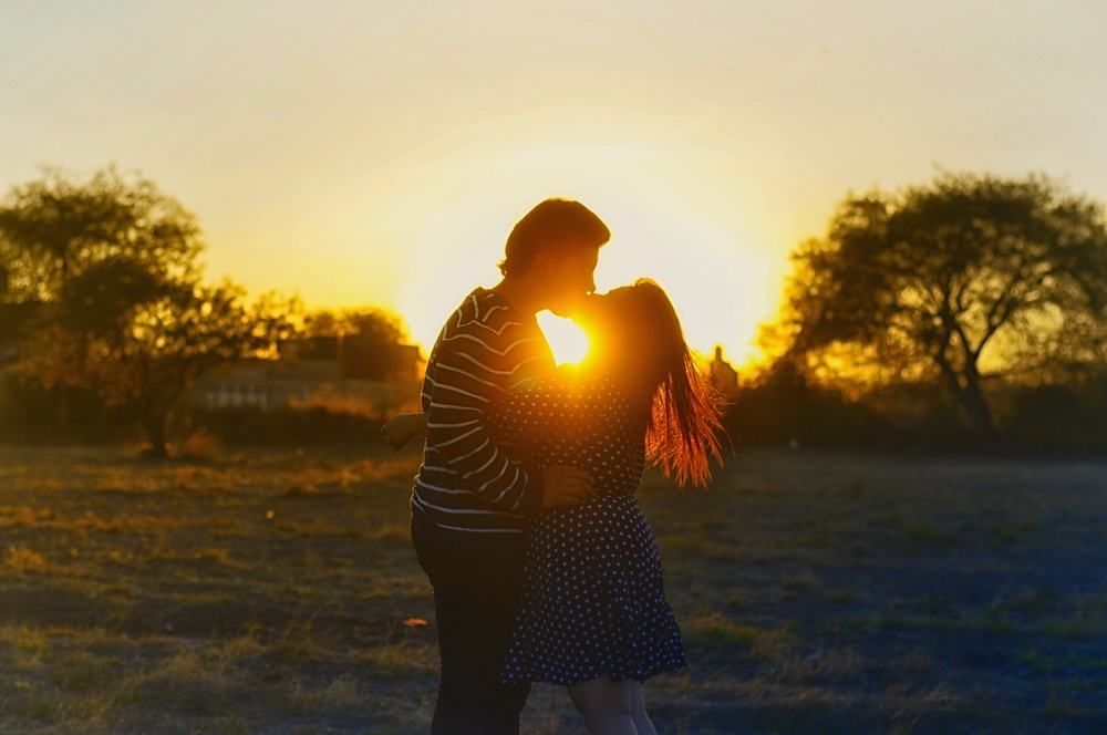 Couple Kissing During Sunset