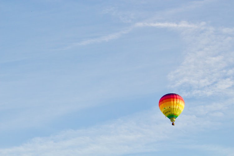 colorful hot air balloon flight high in the morning