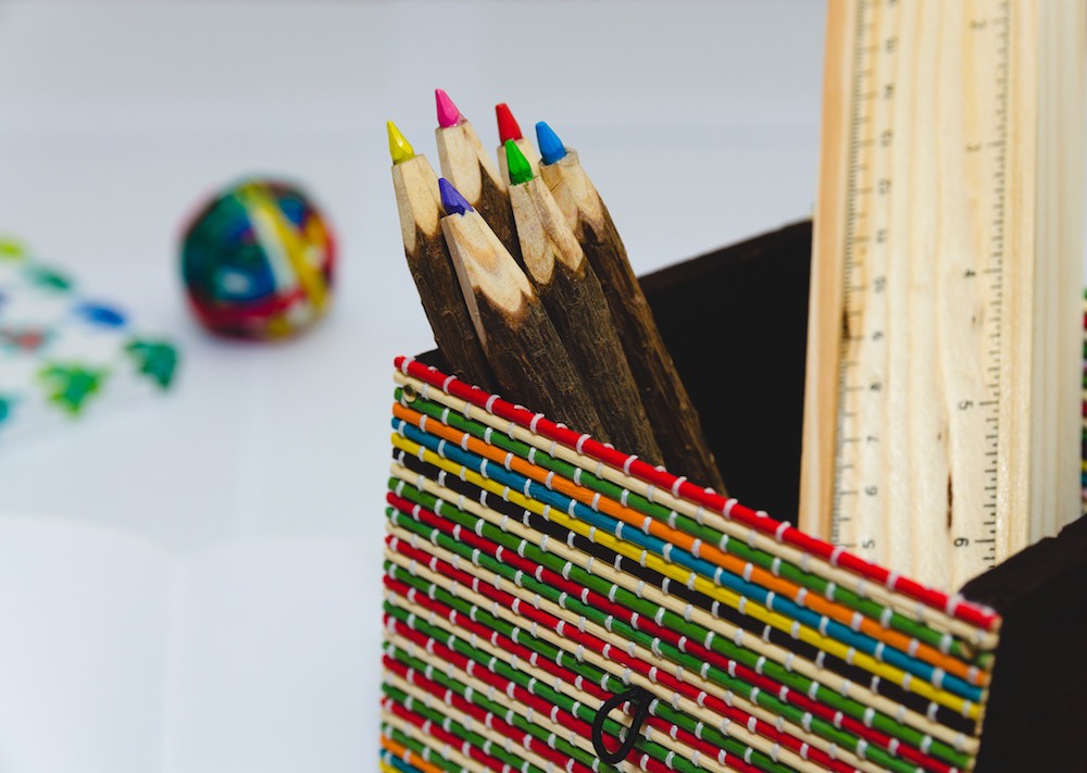 Colored Pencils on a white table desk