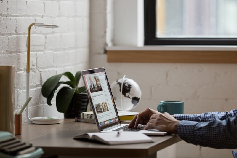 business man using his laptop at home