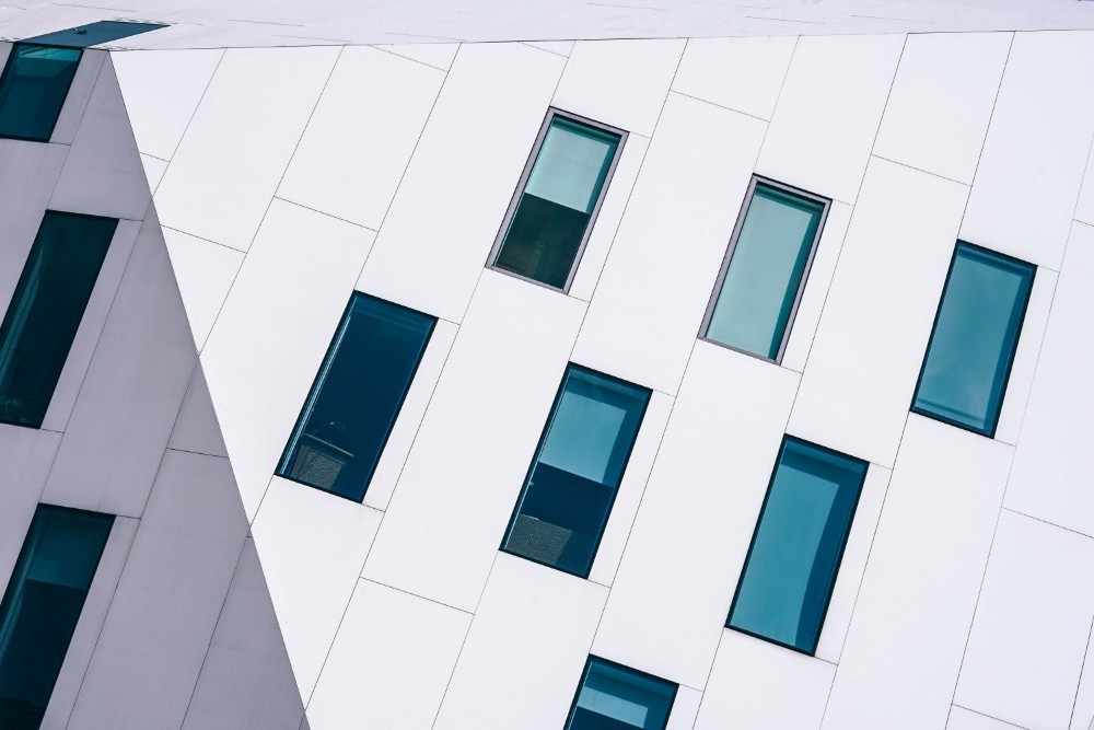 Abstract Blue Windows on a White Building