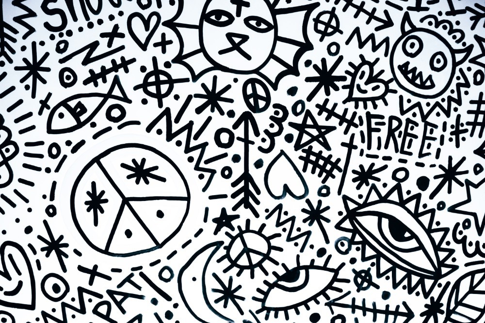 Black and White Doodle Art with Peace Symbols