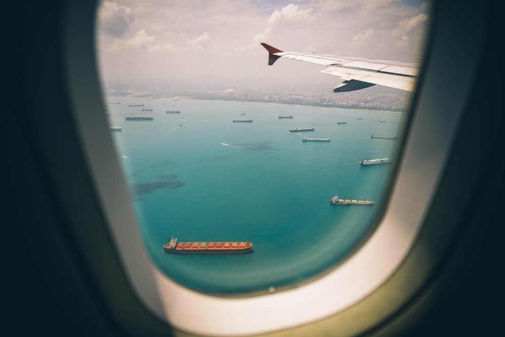 Boats in Singapore Pictured from the Window of an Airplane