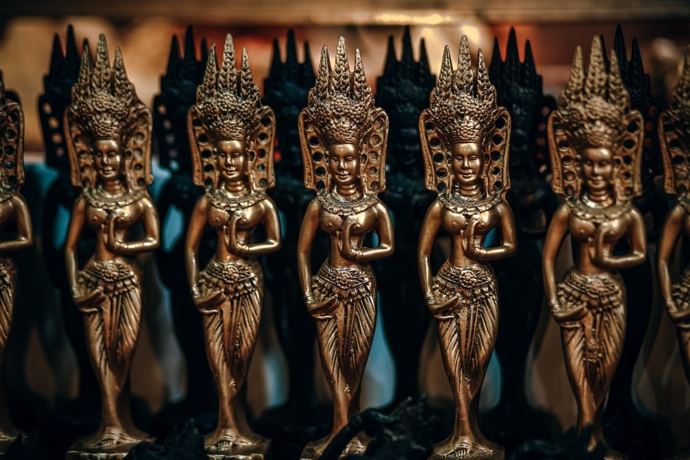 Mini Golden Cambodian Brass Statues for Sale at the Night Market in Cambodia