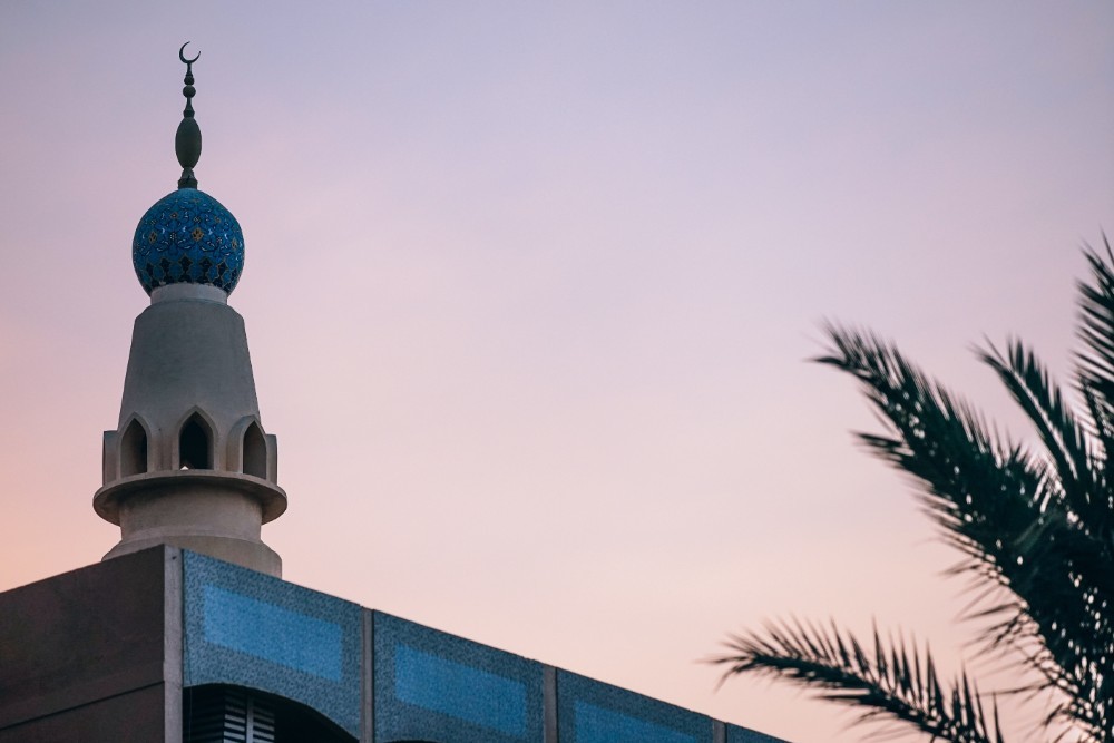 Mosque and Palm Trees Photographed at Sunset