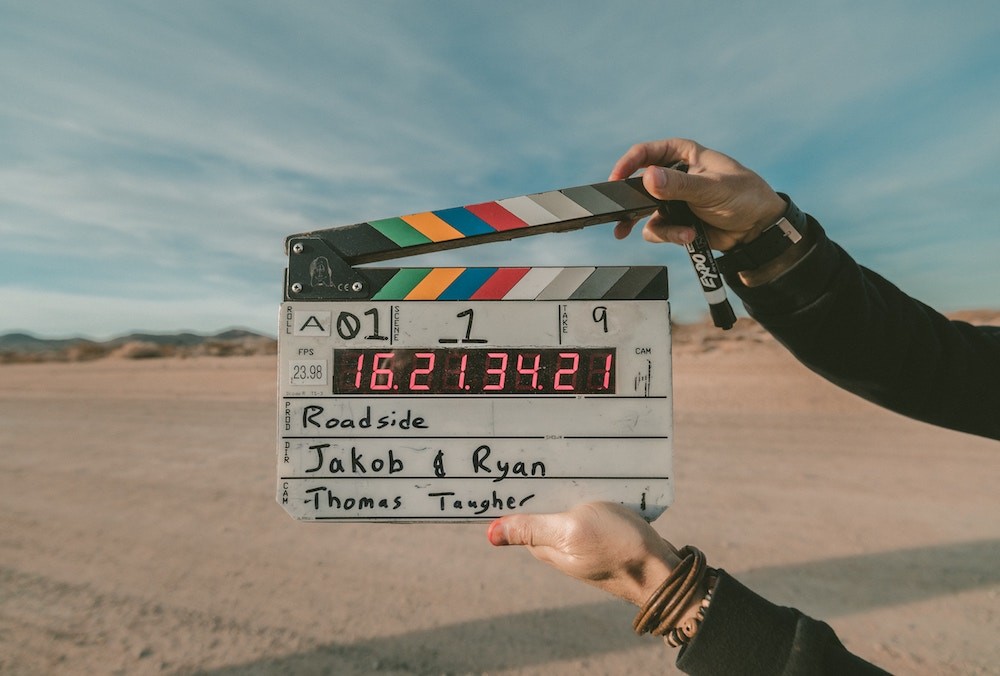 Video production team in the desert