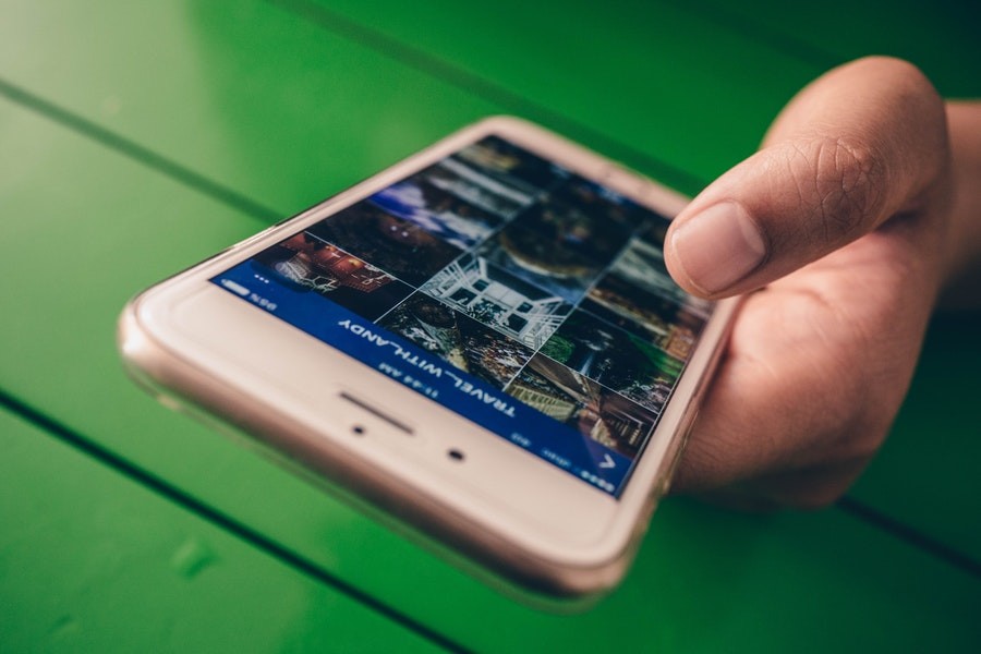 woman using phone to look at instagram