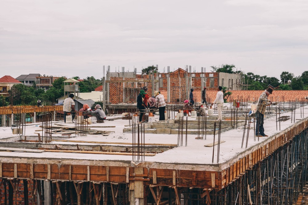 Rooftop Construction Workers in Cambodia