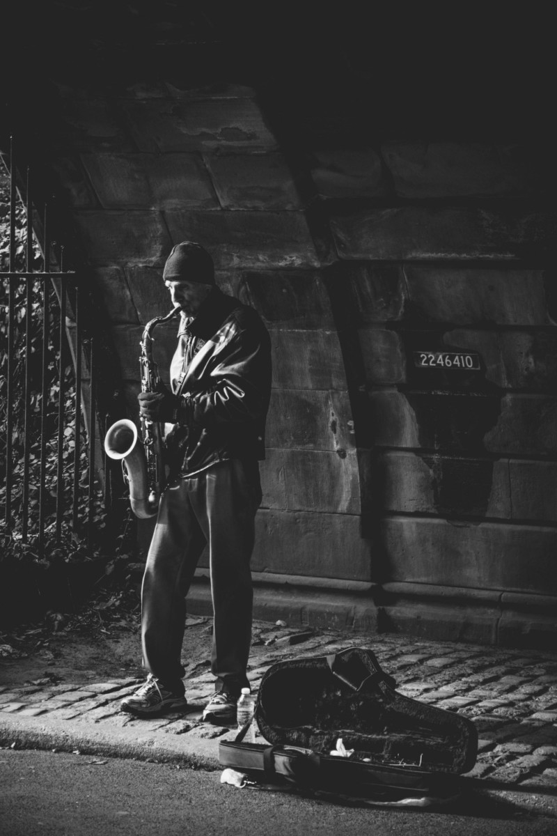 Street Saxophone Player Photographed in Black and White
