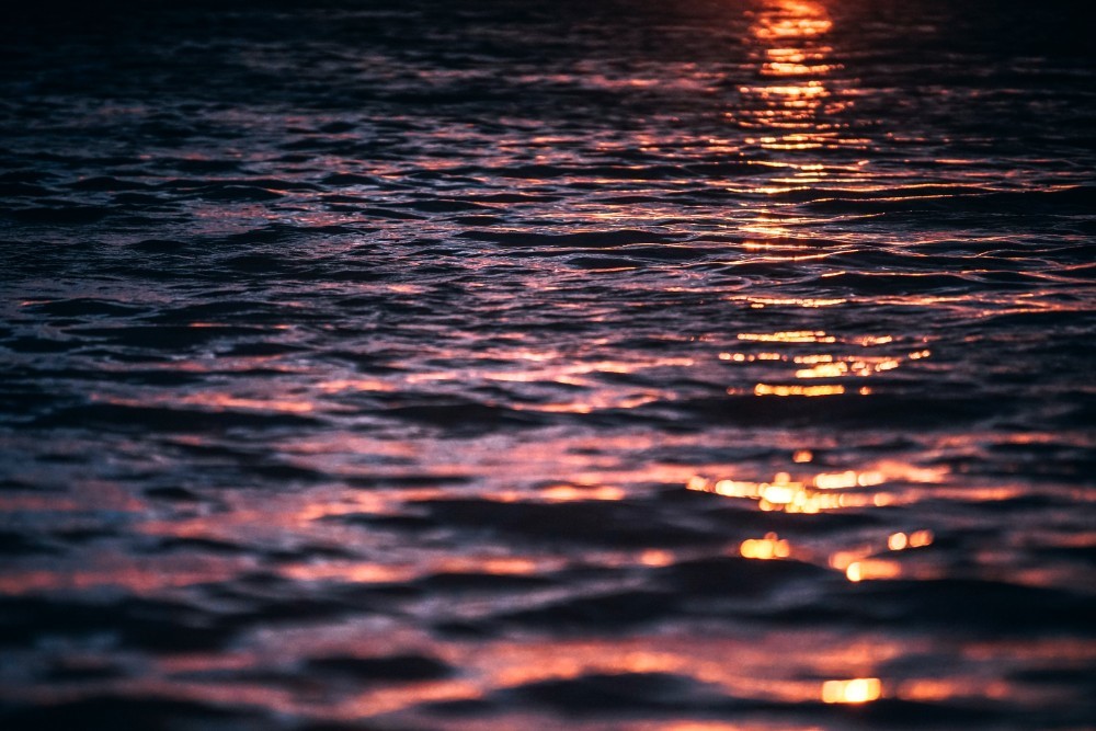 Sunset Reflecting in the Sea Waves