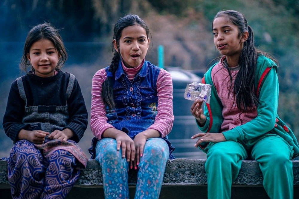 Three Indian Teenage Girls Looking Towards the Camera