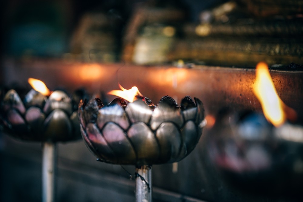 Candle Prayers in a Thai Temple