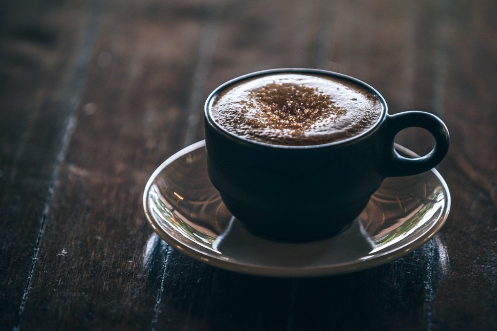 Close-up Shot of Coffee inside a Black Mug