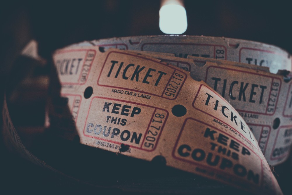 Close-up Shot of a Roll of Coupons and Tickets