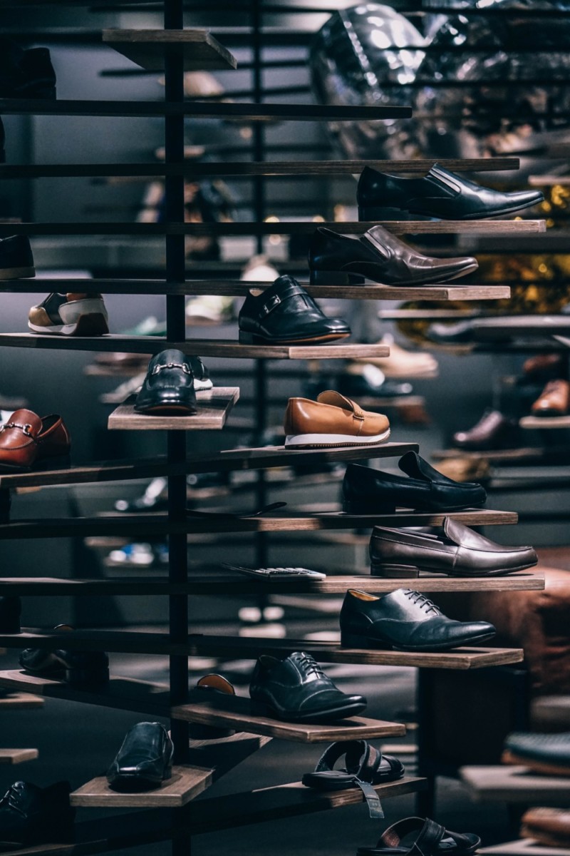 Many Different Men’s Shoes Displayed for Sale