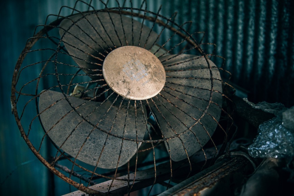 Old Abandoned Fan with a Rusty Frame