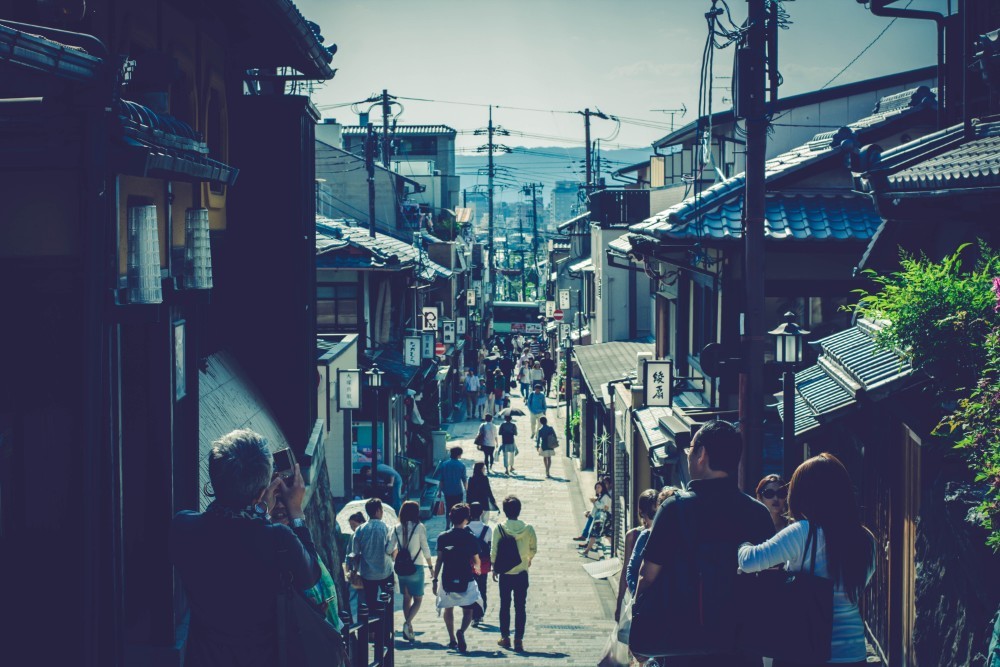 People Walking Through the Streets of Kyoto, Japan