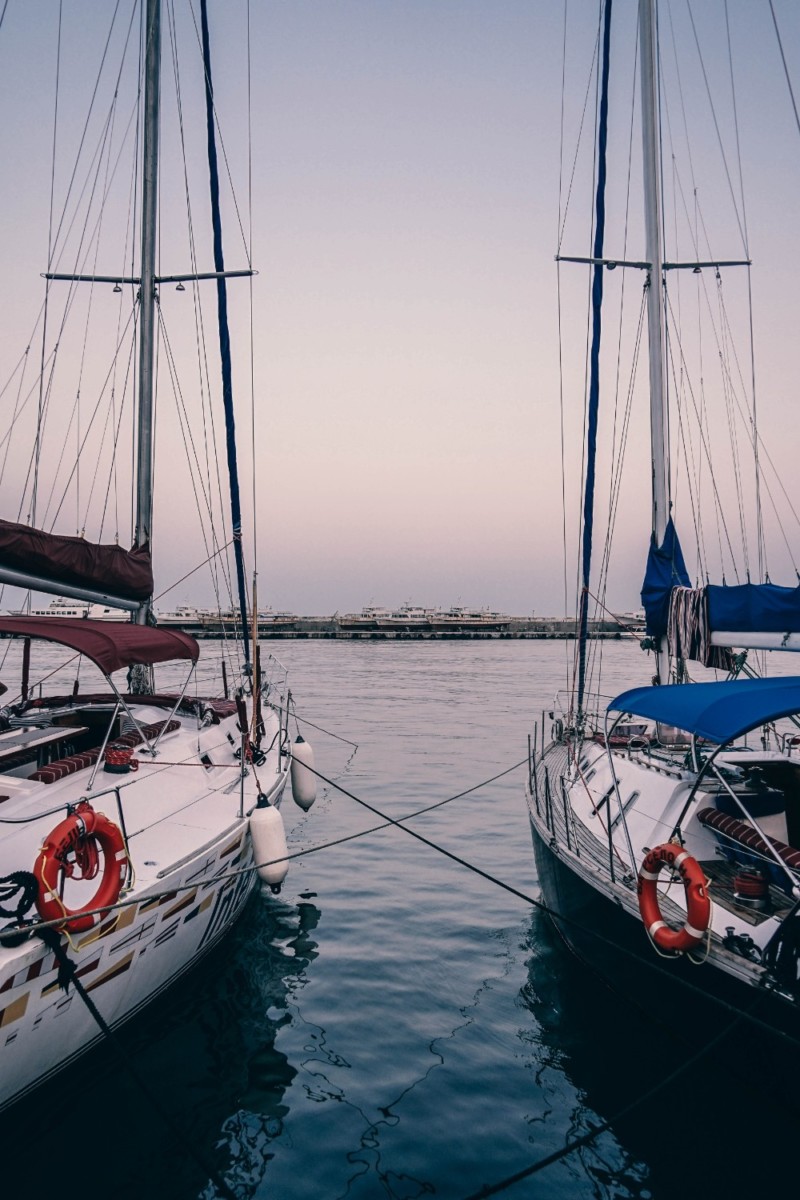 Two Docked Boats Photographed at Sunset