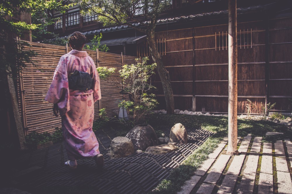 Woman in a Pink Japanese Kimono Photographed in a Chill Garden