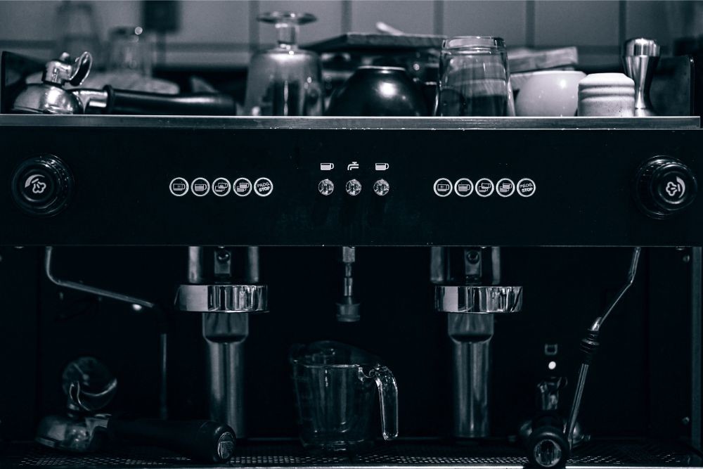 Black and White Photography of a Coffee Machine