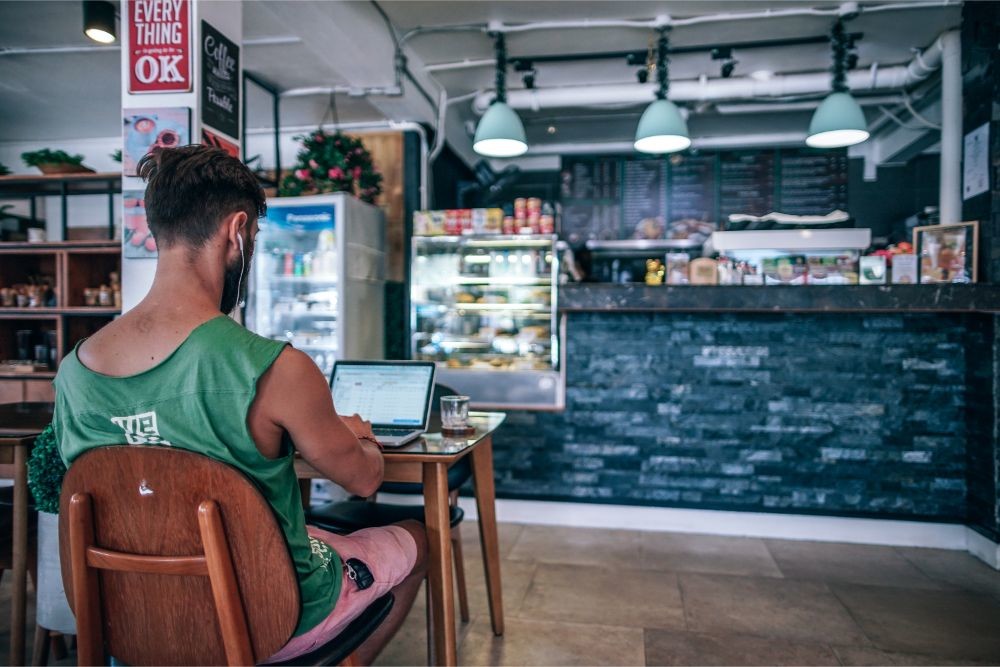 Digital Nomad Working at a Coffee Shop