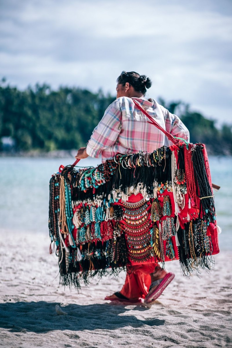 Jewelry Seller walking across the Beach