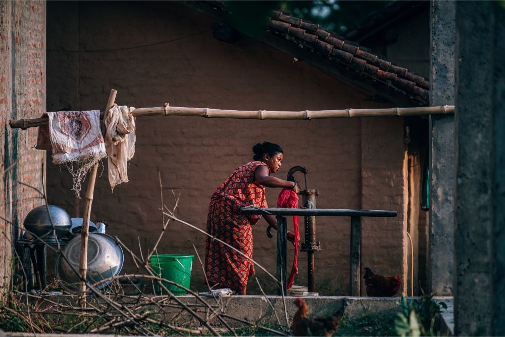 Nepali Woman Washing Her Clothes