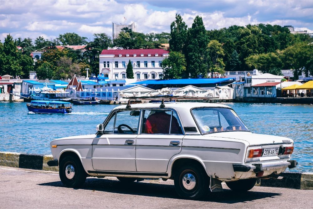 Old White Lada Parked by the Bay in Sevastopol
