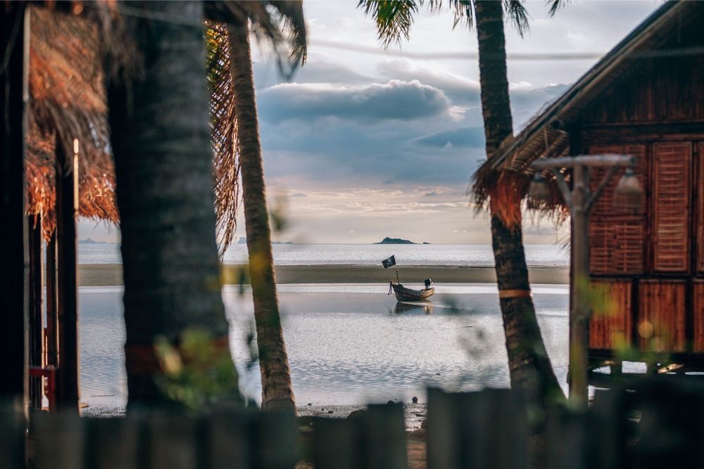 Small Pirate Boat behind a Bungalow Resort in Thailand