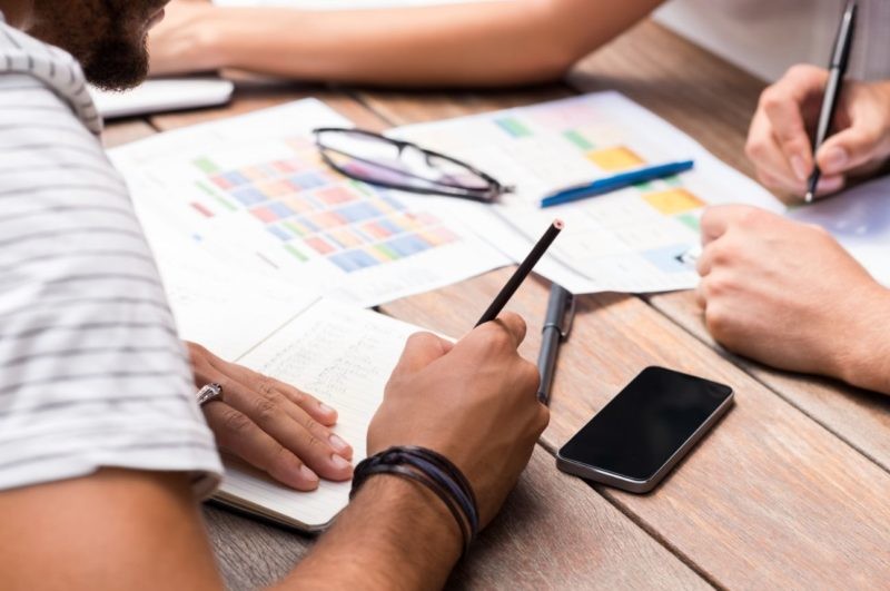 students writing notes