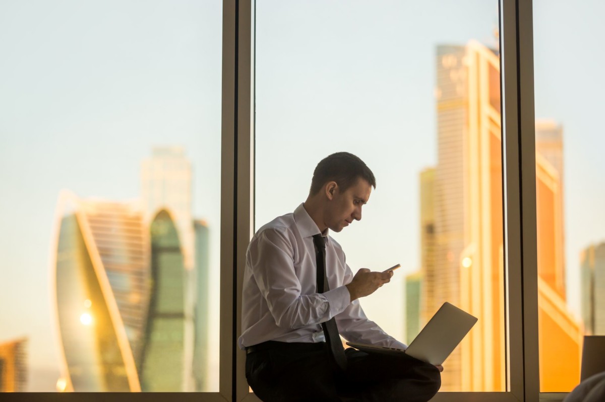 successful businessperson in his office PLMHM