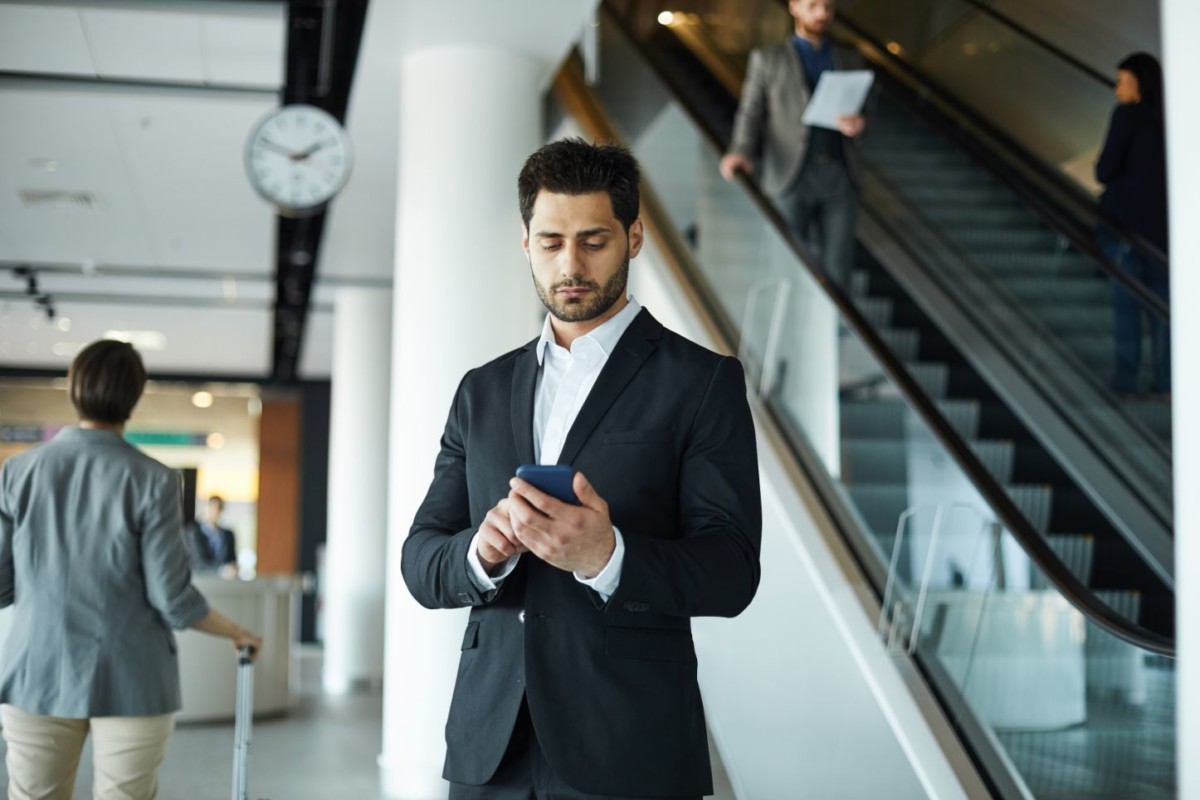 handsome businessman browsing internet EHNCM