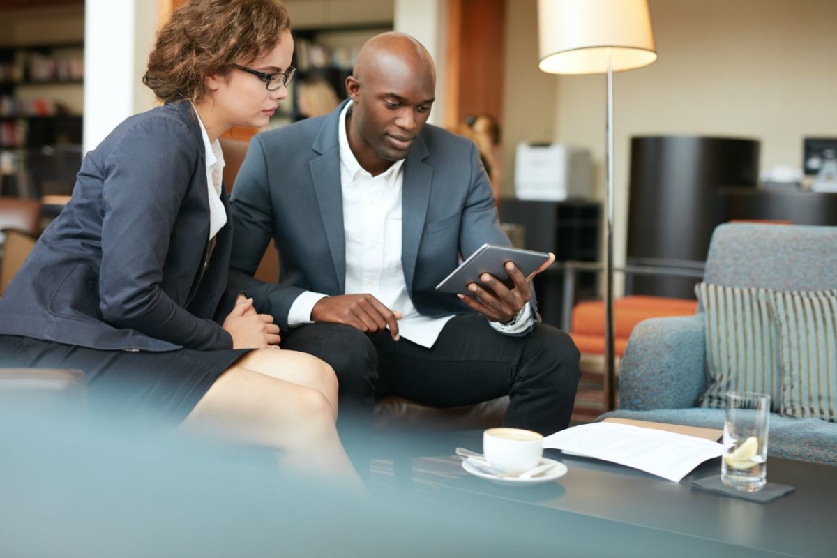 business people meeting in a coffee shop PJVTBG