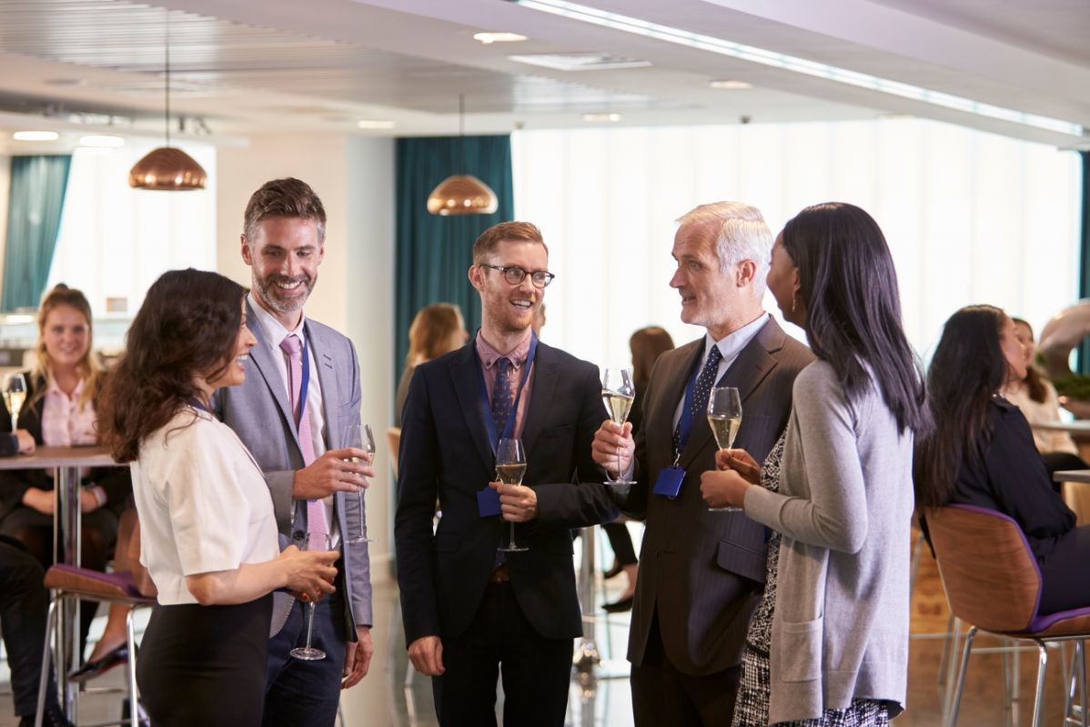 delegates networking at conference drinks PLCKMY