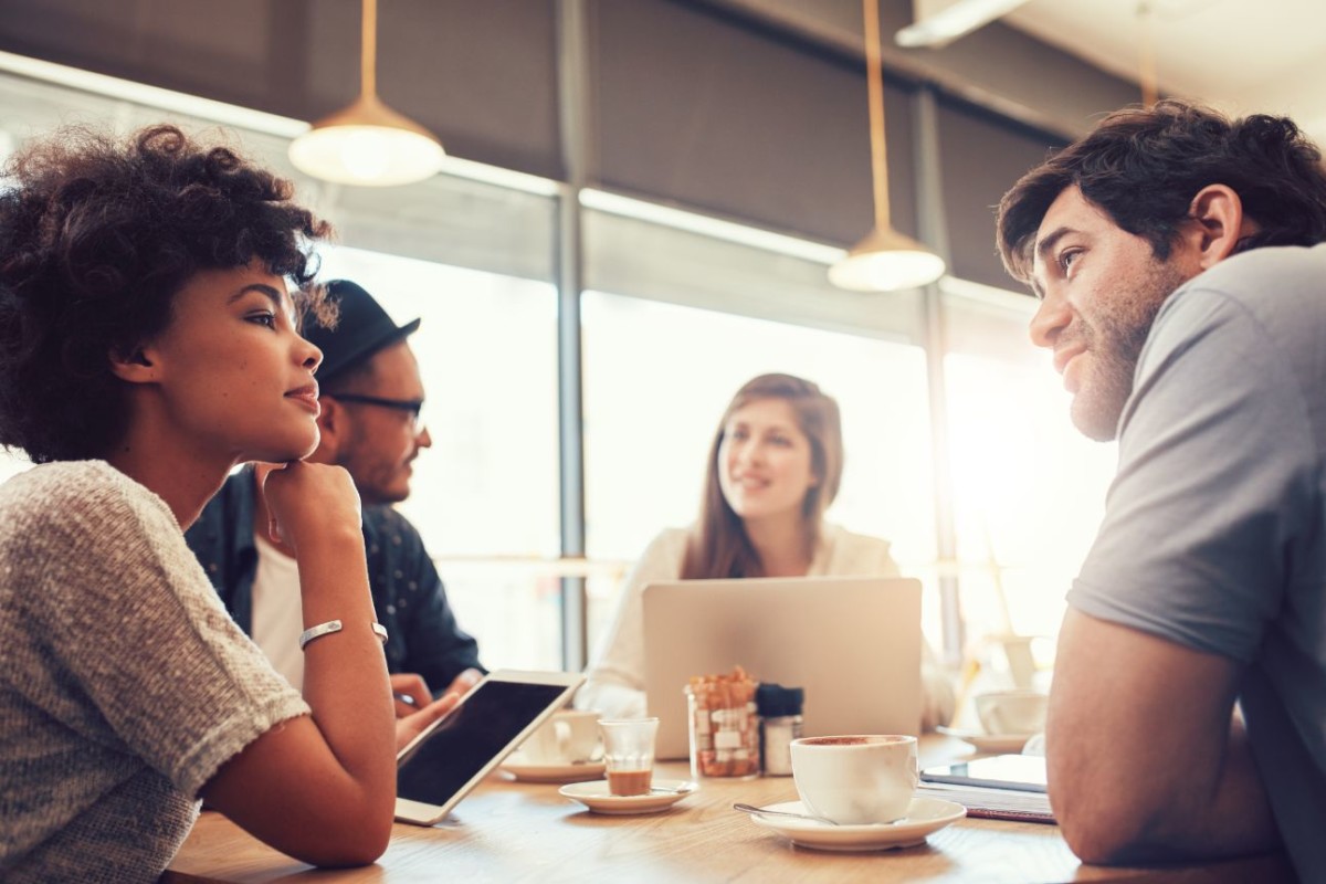 group of people at coffee shop for startup PWE