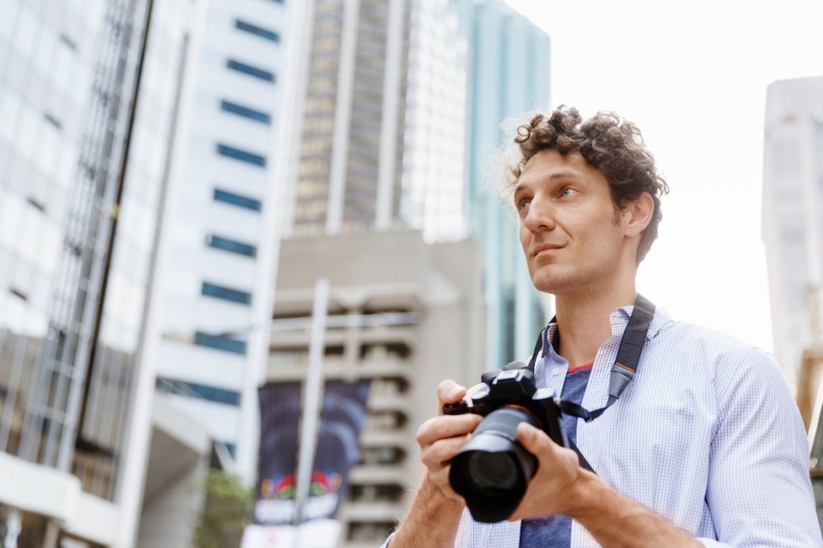 male photographer taking picture PDJNAK