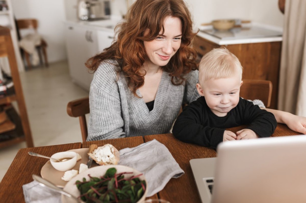 smiling mother in knitted sweater and little son LGTVMP