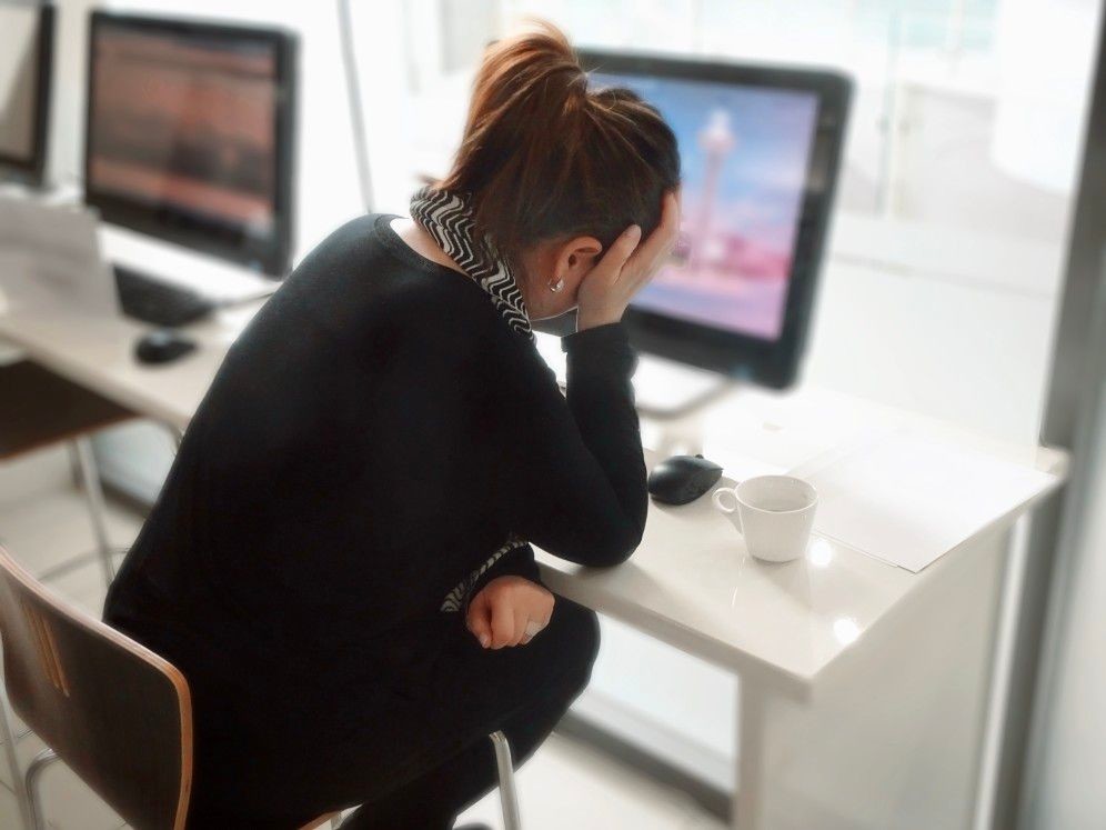 emotions stress professional business woman feeling stressed at her work desk in front of computer t JzW