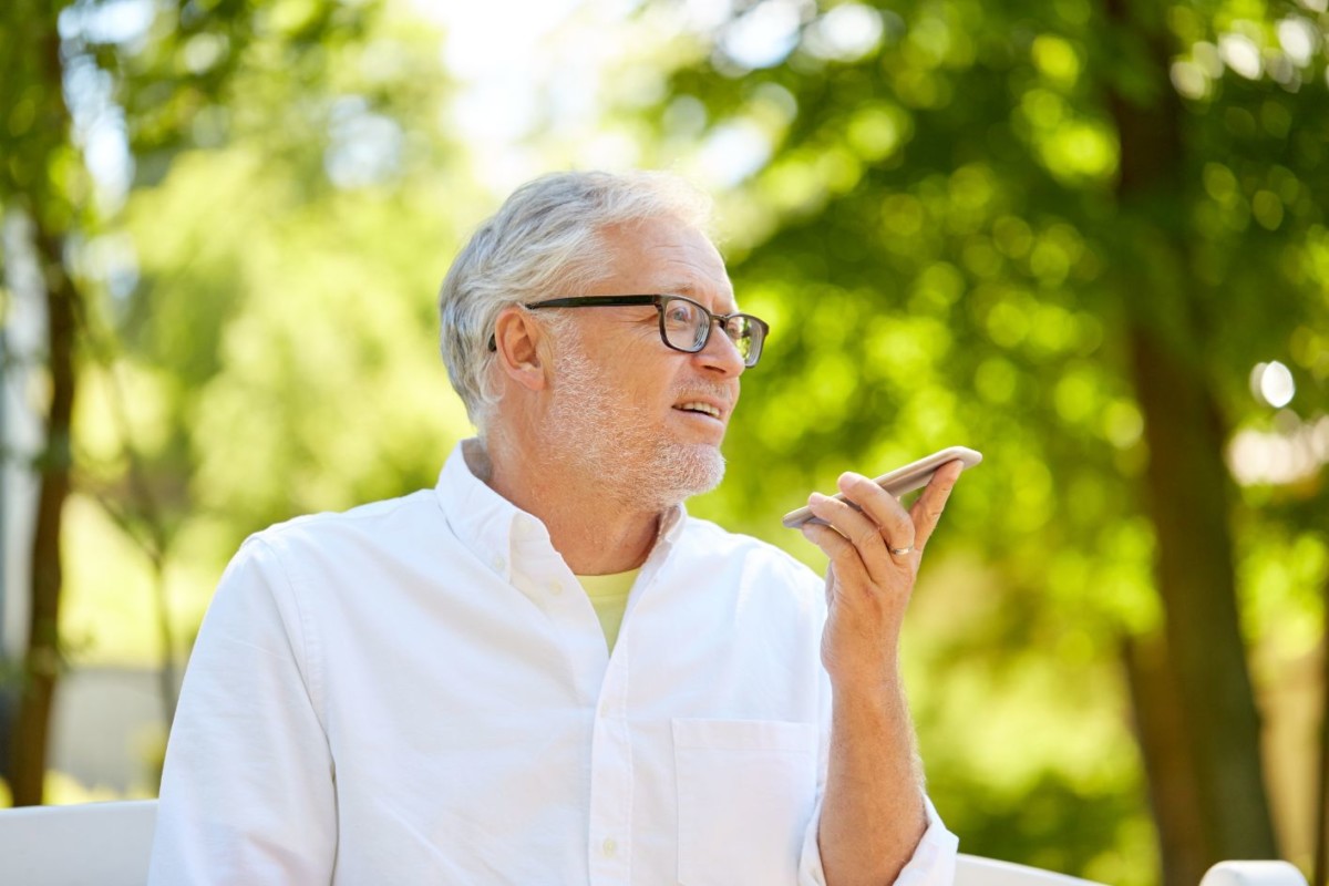 old man using voice command recorder on PLPPG