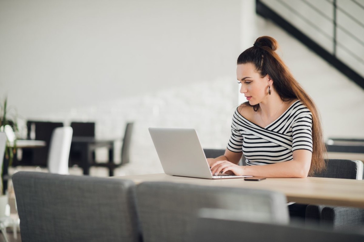 attractive concentrated adult woman browsing the NJVS