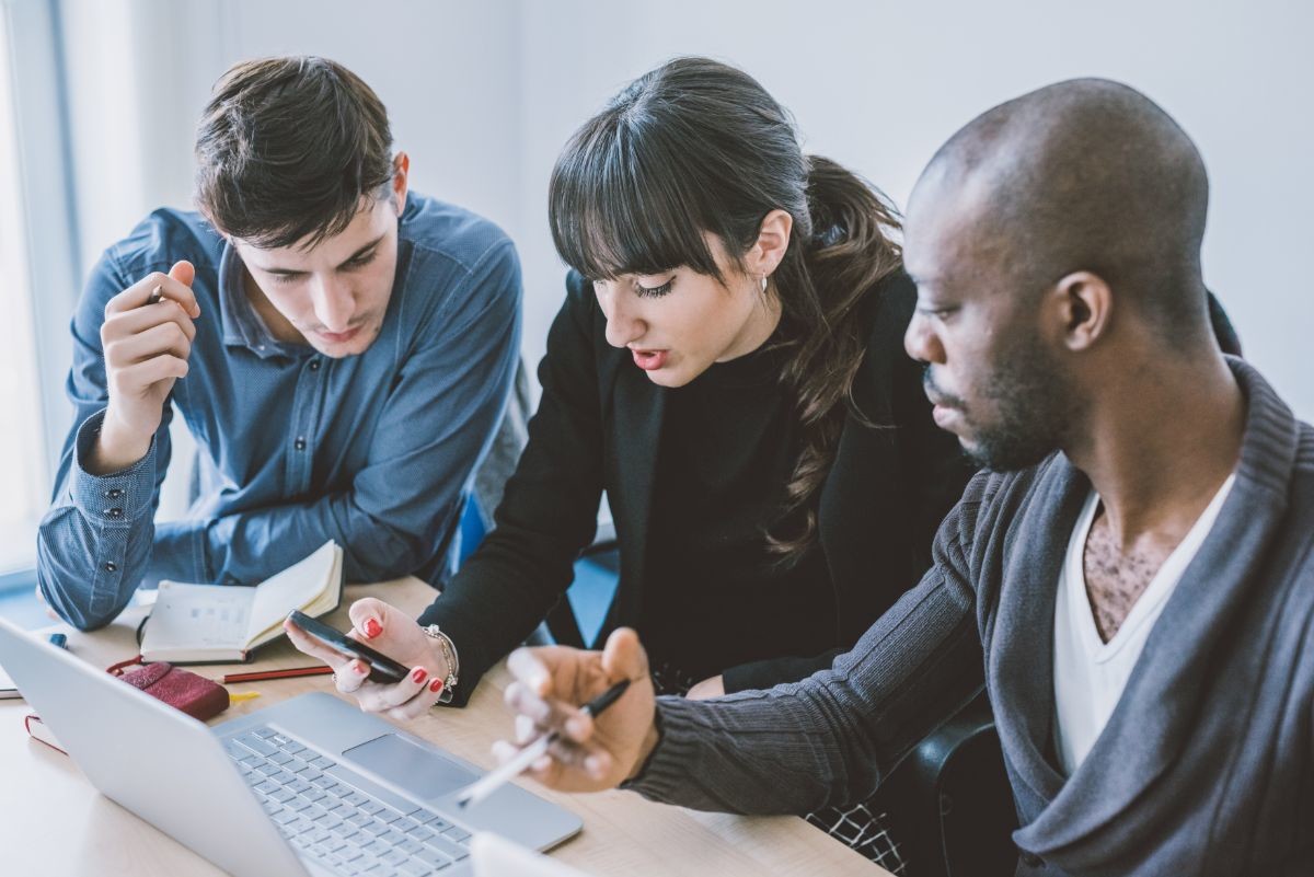 multiracial business people working together PKWULK