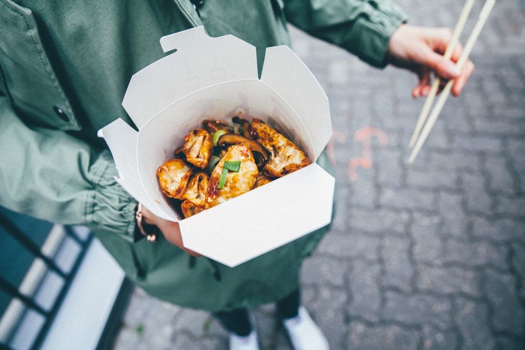 food holding street hands japanese takeaway street food t ZzbXn