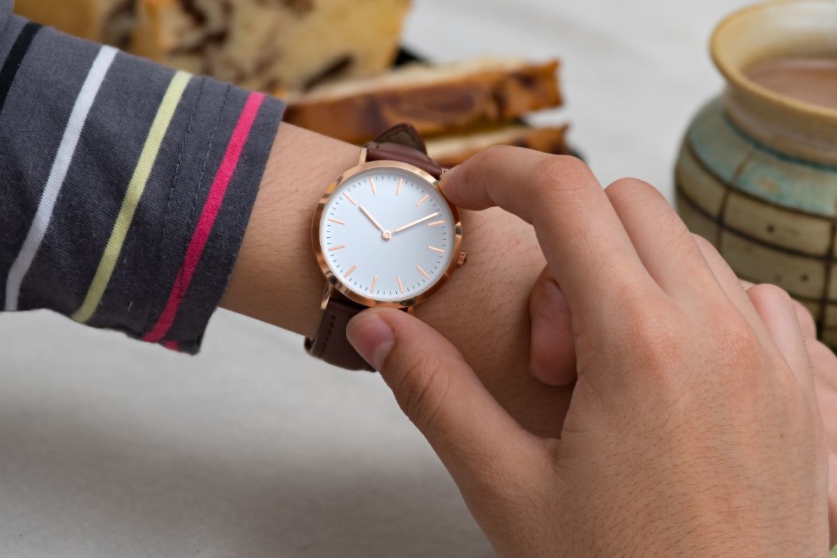 girls hand with wrist watches at the coffee break PCUB