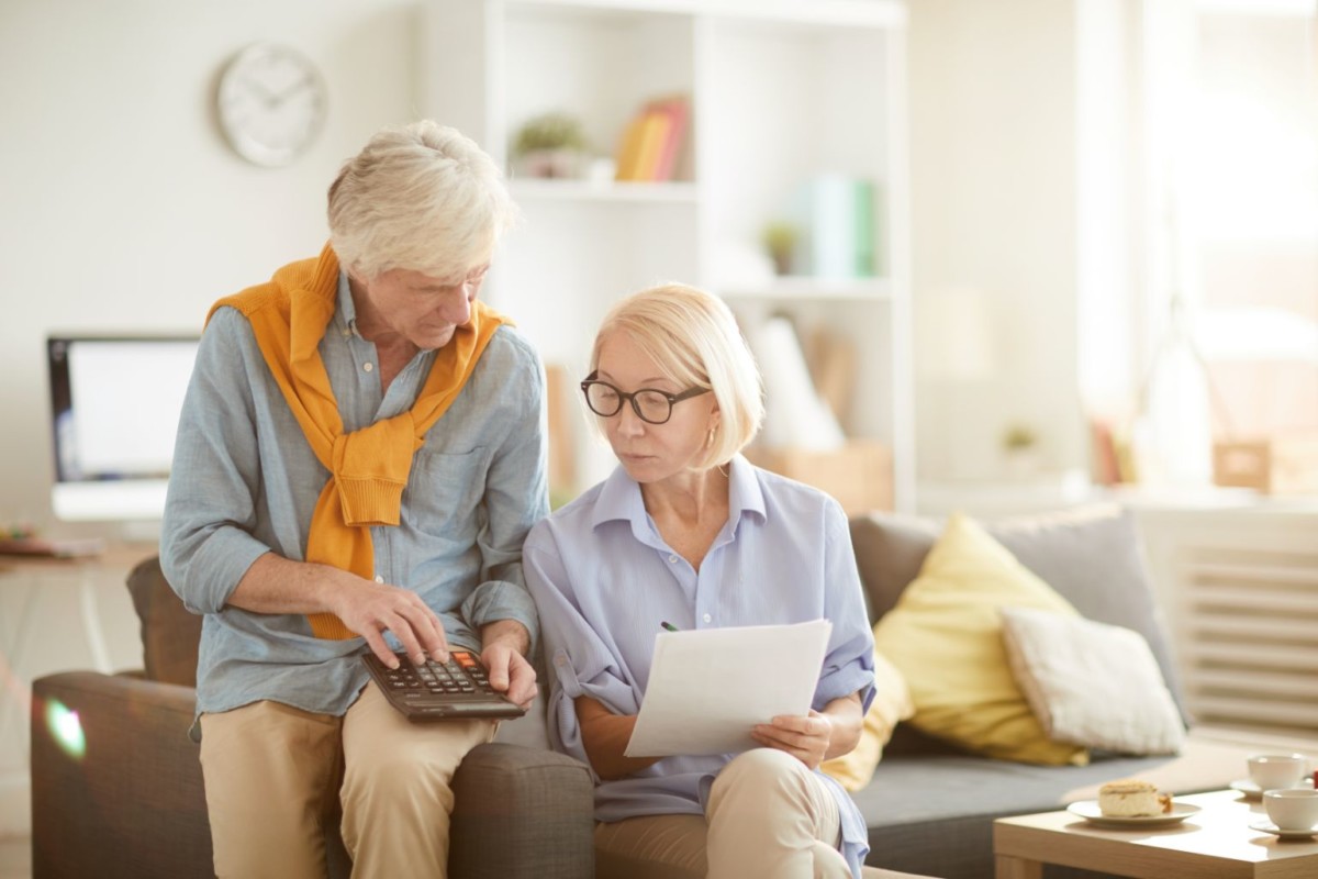 senior couple calculating budget VNWPL