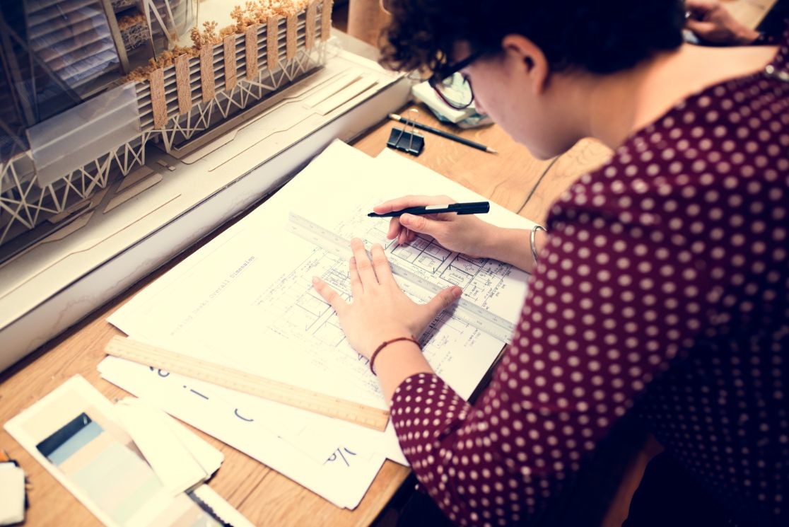 woman working on document work PAGUZM