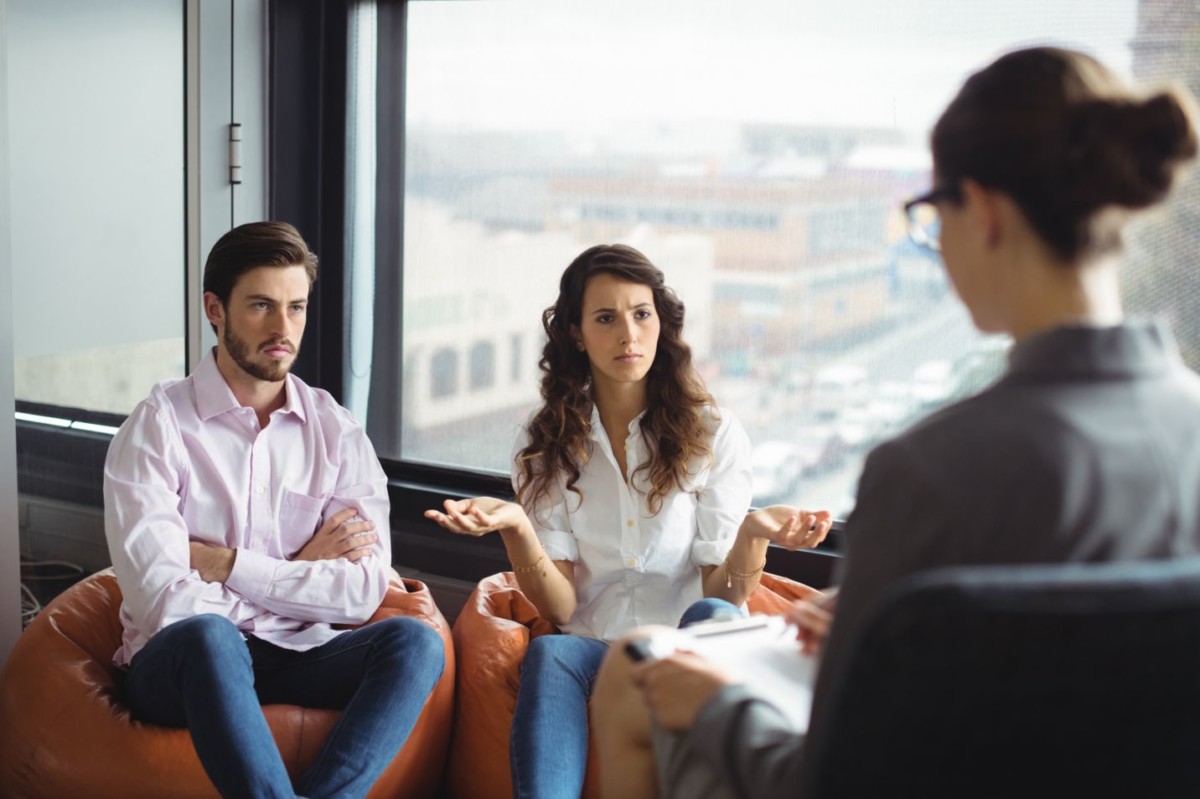 couple talking to a marriage counselor during ther XTC