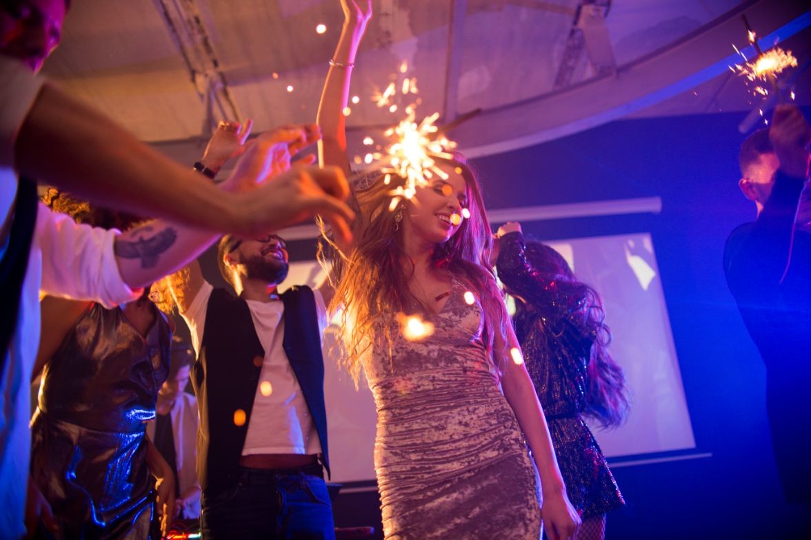 young woman dancing at awesome party DYNHV