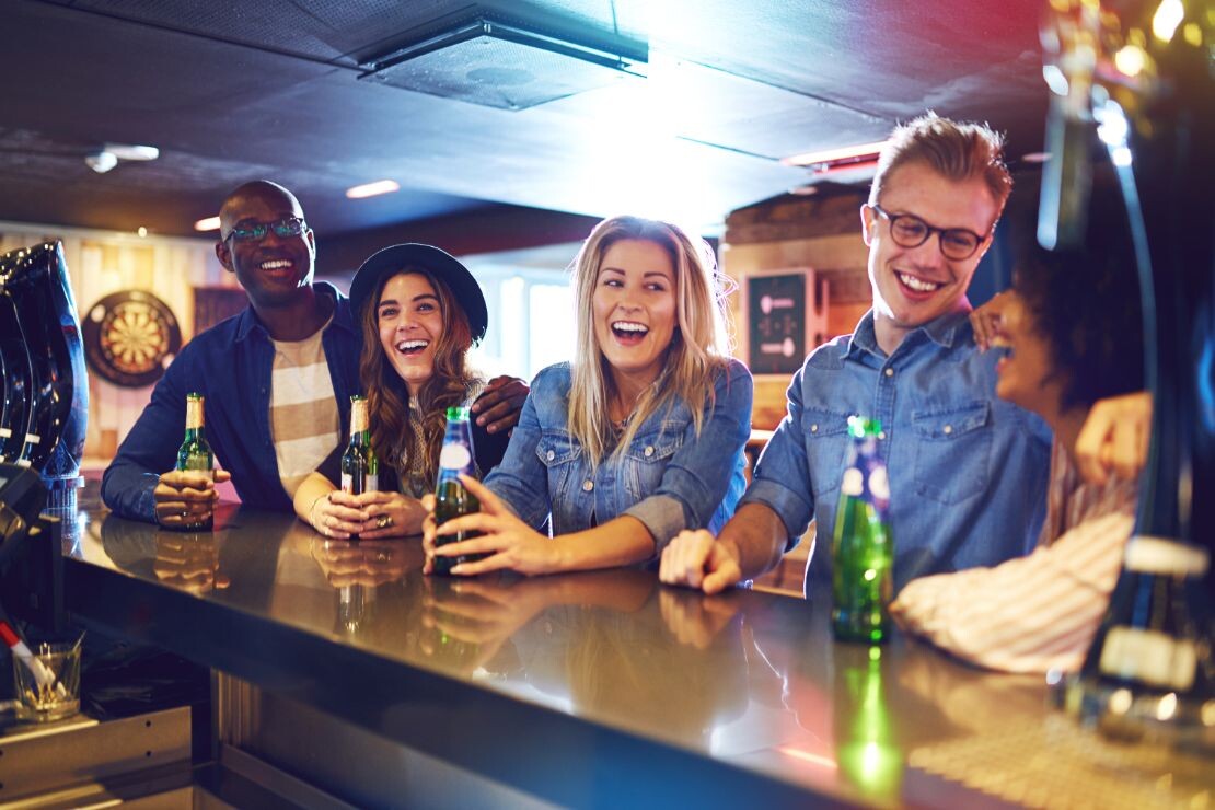 cheerful party with beer in the bar BQSXLHV