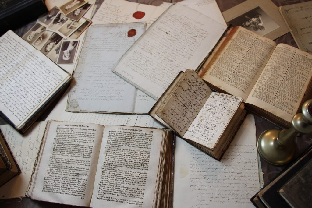 vintage journals laying on the table