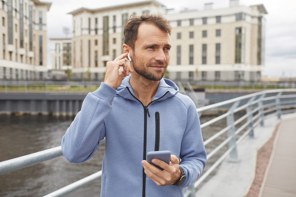 man listening to music while running